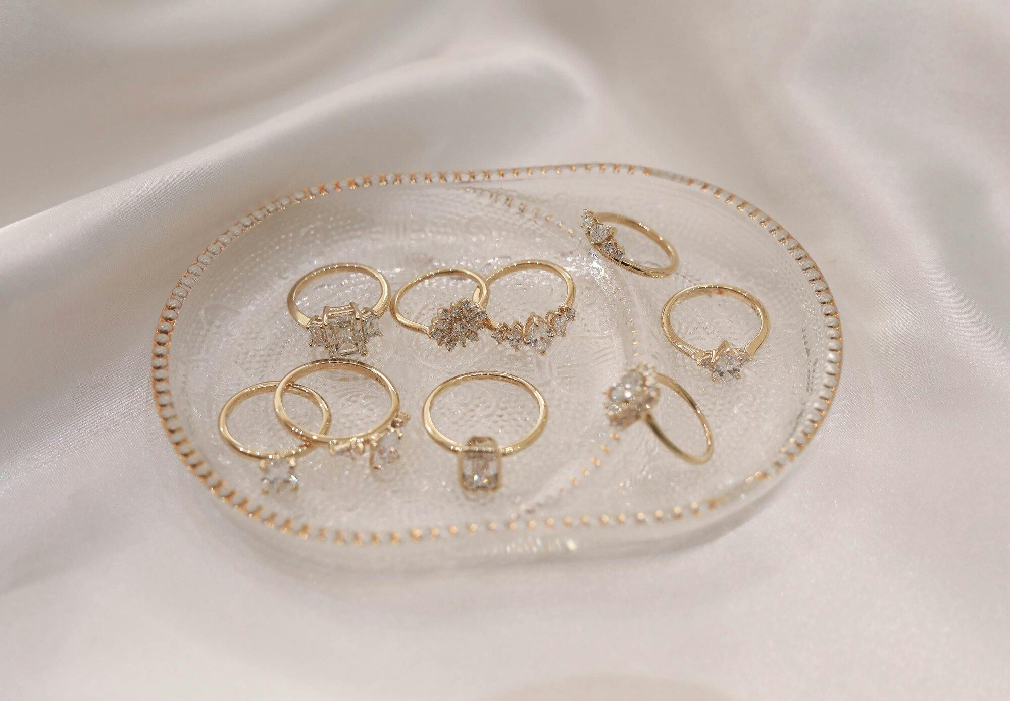 group shot of rings in a glass dish