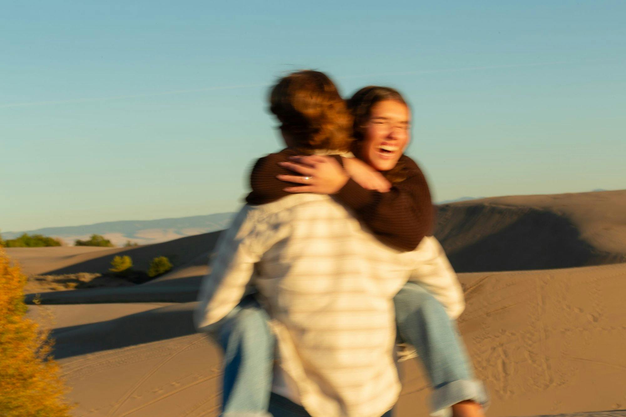 couple smiling in the desert