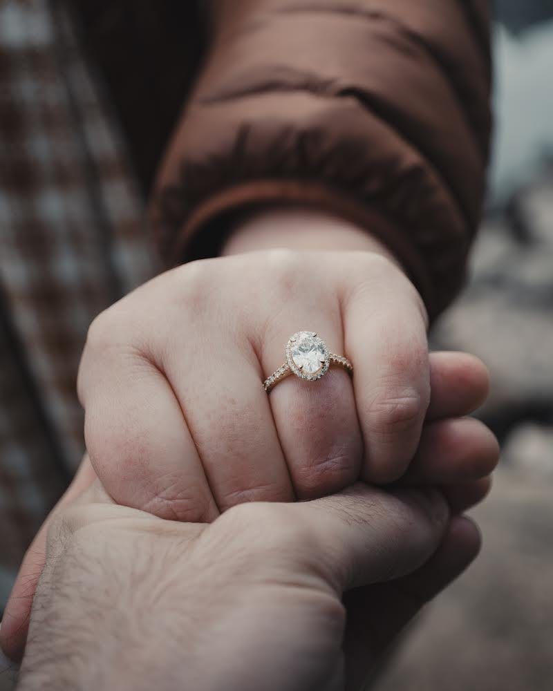 a handshot of an engagement ring